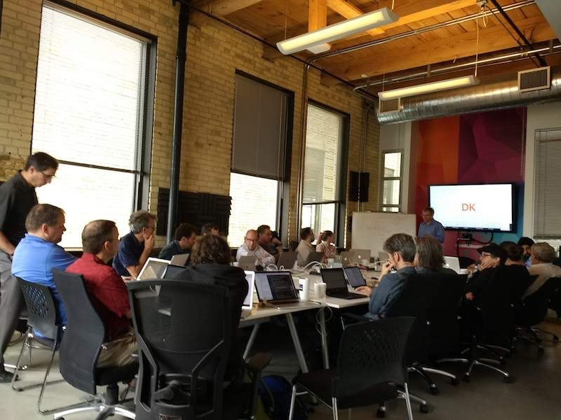 Image of the WG around the meeting table
